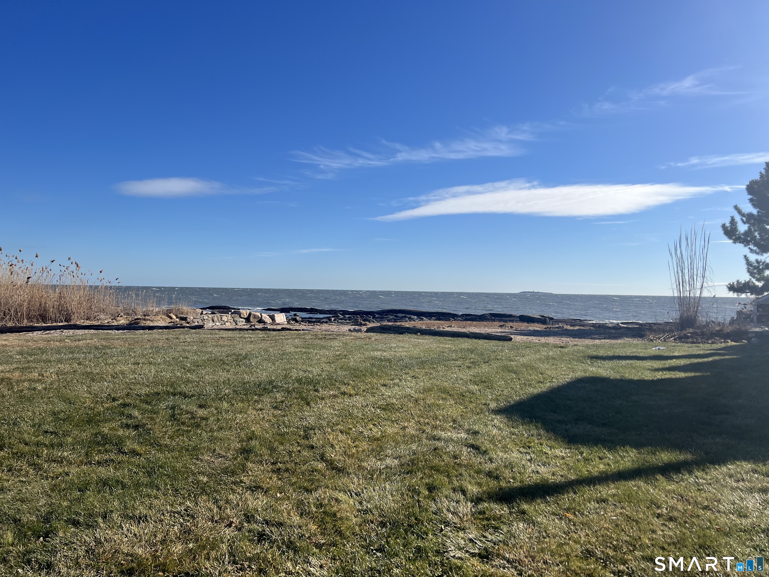 624 Vineyard Point Road Guilford, CT 06437 - Photo 34 of 40 a view of an ocean and beach