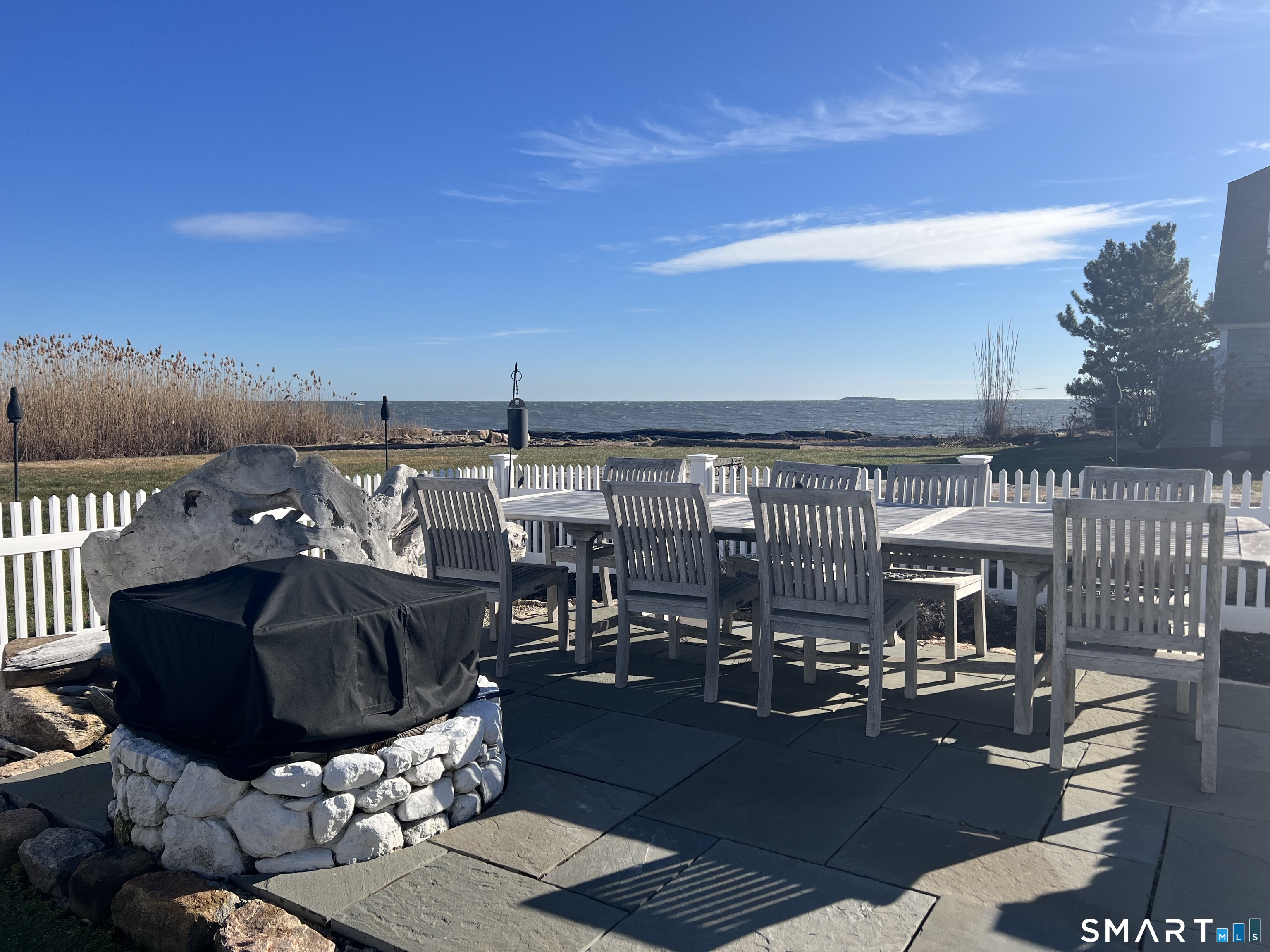 624 Vineyard Point Road Guilford, CT 06437 - Photo 37 of 40 a view of a balcony with chairs