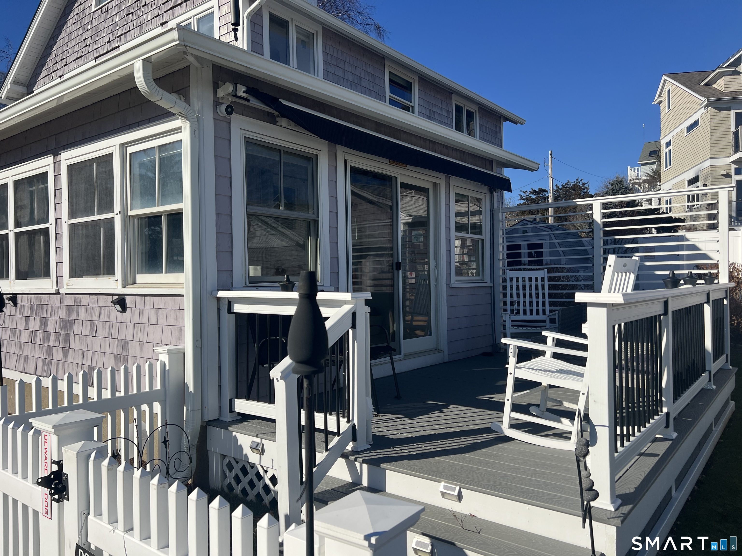 624 Vineyard Point Road Guilford, CT 06437 - Photo 38 of 40 front view of a house with a porch