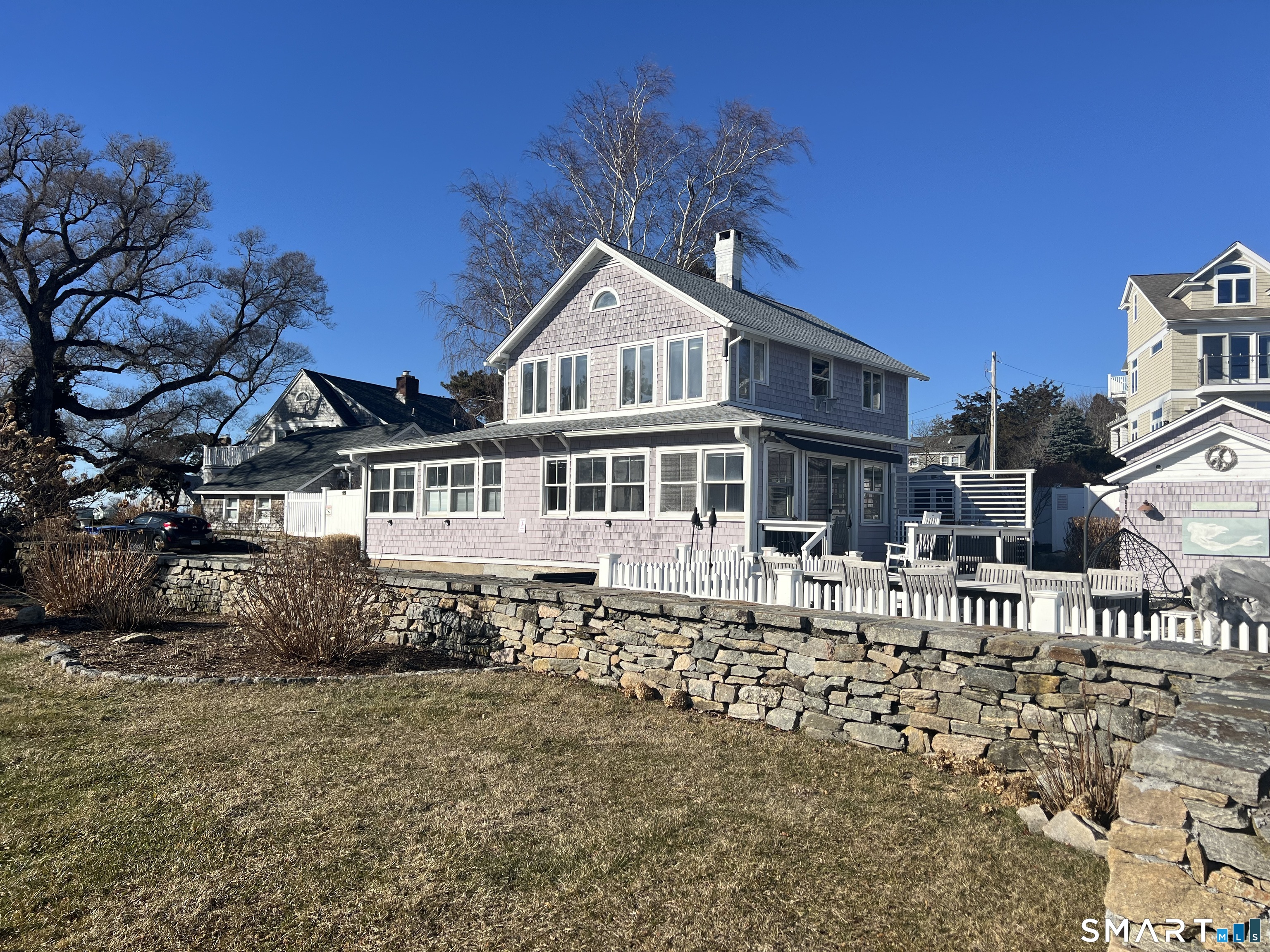624 Vineyard Point Road Guilford, CT 06437 - Photo 39 of 40 a house view with a garden space