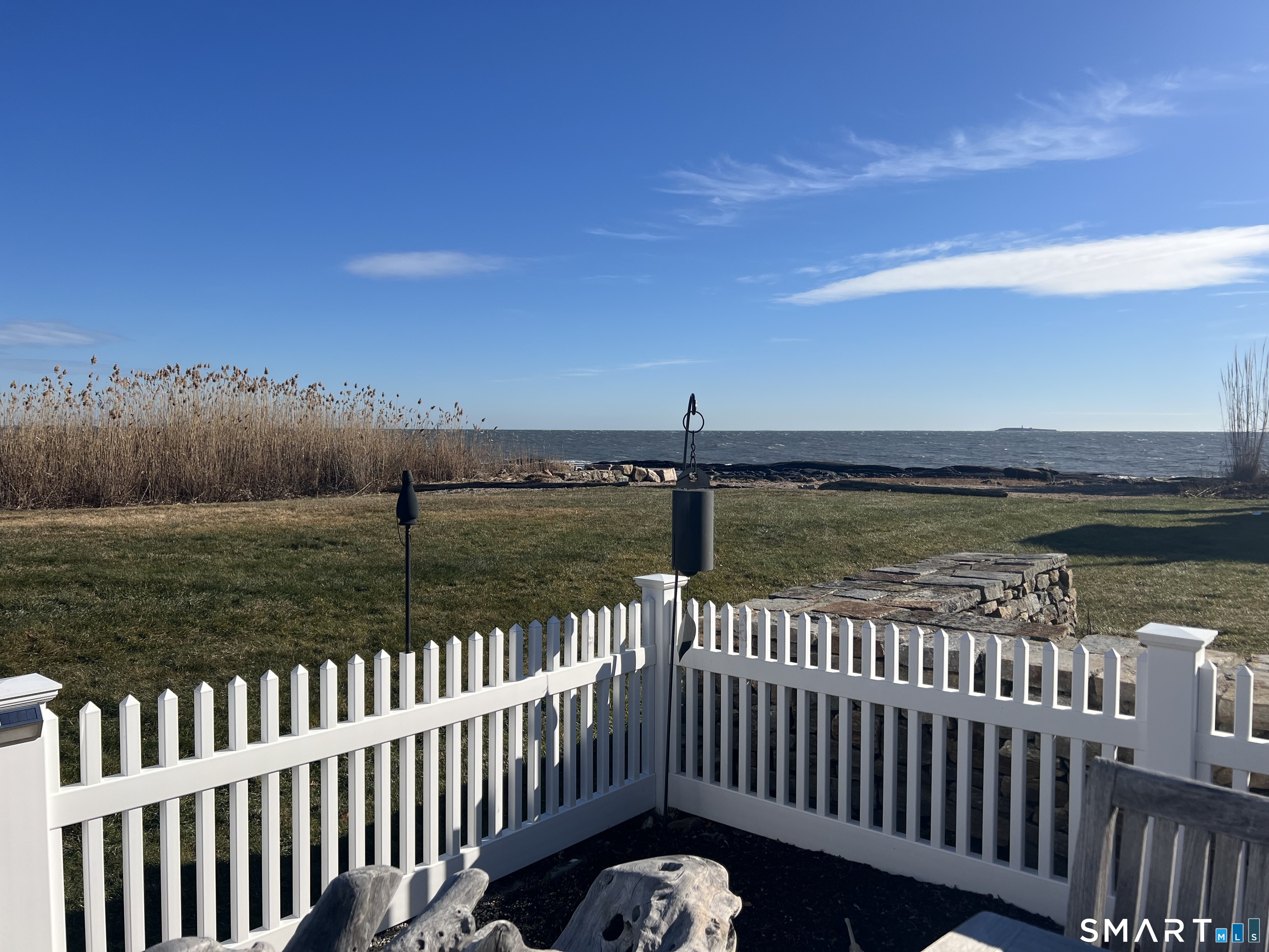 624 Vineyard Point Road Guilford, CT 06437 - Photo 40 of 40 a view of wooden deck and ocean view
