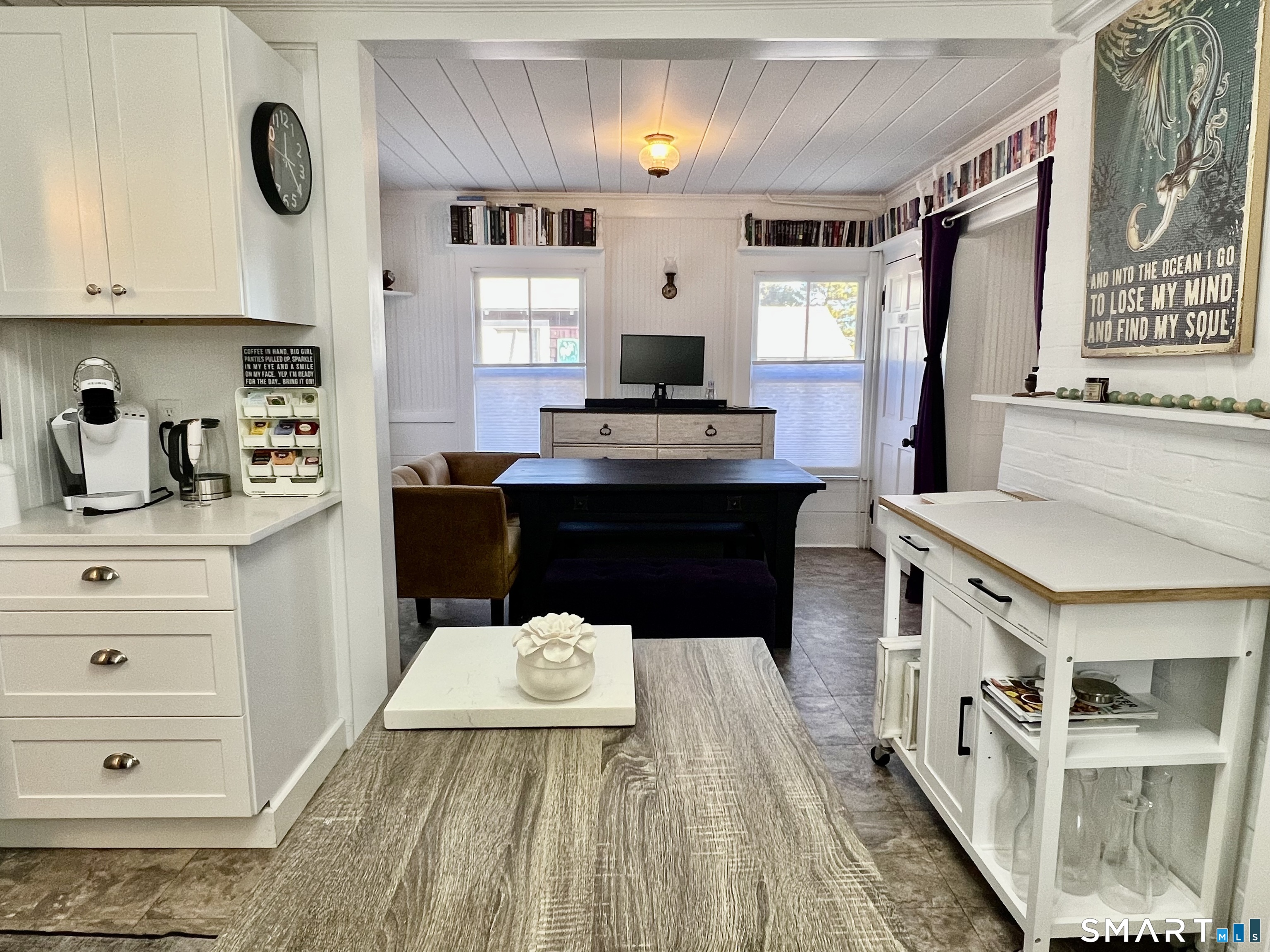 624 Vineyard Point Road Guilford, CT 06437 - Photo 8 of 40 a kitchen with a stove and a white refrigerator