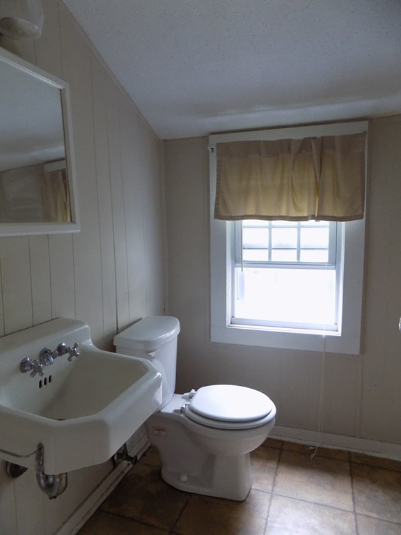 35 Burnside Terrace Springfield, MA 01118 - Photo 12 of 12 a bathroom with a sink and a toilet