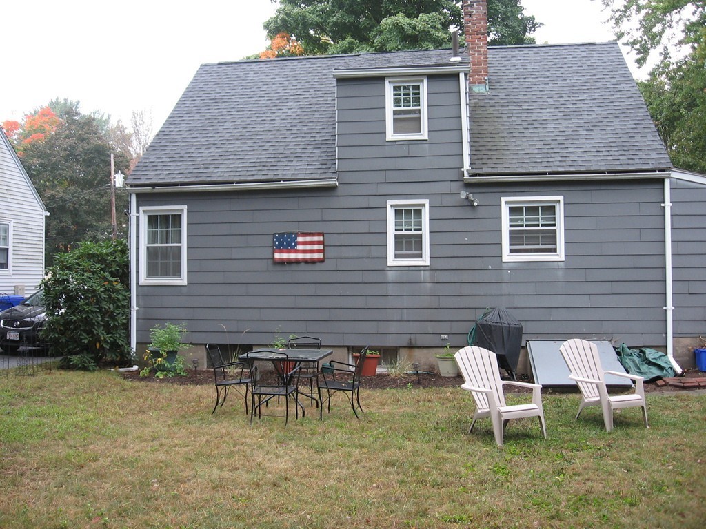 35 Burnside Terrace Springfield, MA 01118 - Photo 6 of 12 a backyard of a house with outdoor seating