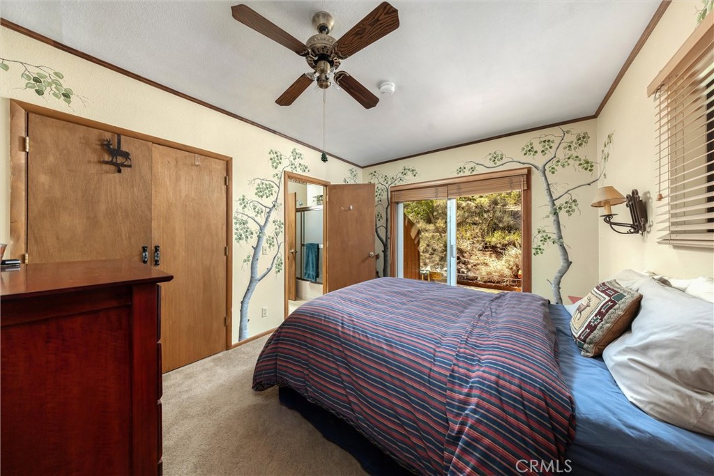 251 Forest Road June Lake, CA 93529 - Photo 29 of 75 Upstairs bedroom with sliding glass doors to private deck
