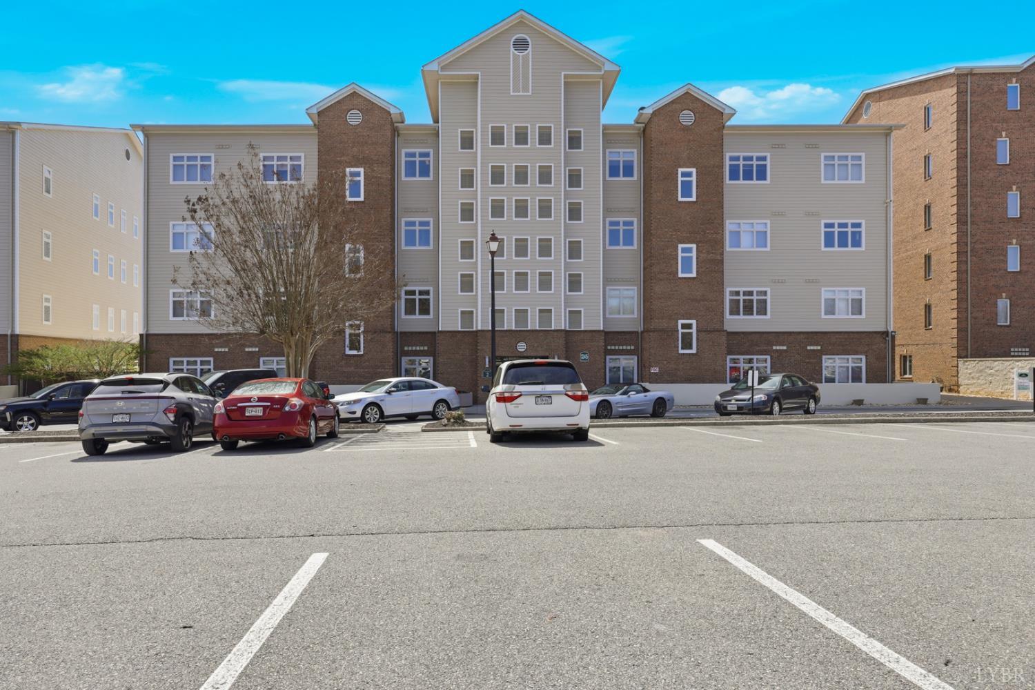 1245 Graves Harbor Trail, Unit 2101 Huddleston, VA 24104 - Photo 23 of 40 a car parked in front of a building