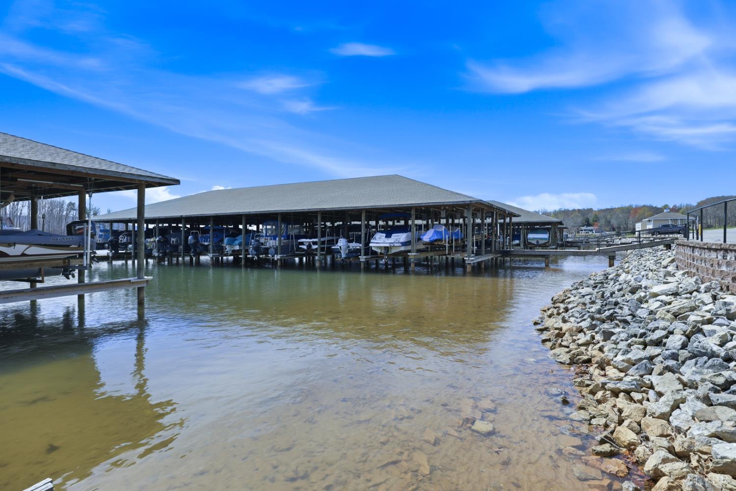 1245 Graves Harbor Trail, Unit 2101 Huddleston, VA 24104 - Photo 26 of 40 a view of a lake with a city view