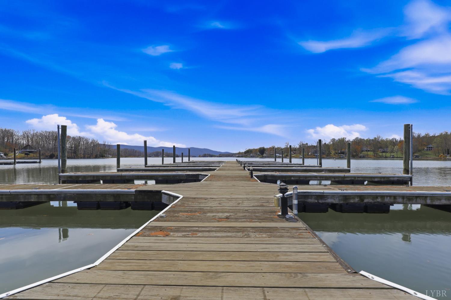 1245 Graves Harbor Trail, Unit 2101 Huddleston, VA 24104 - Photo 31 of 40 a view of a lake with sitting area