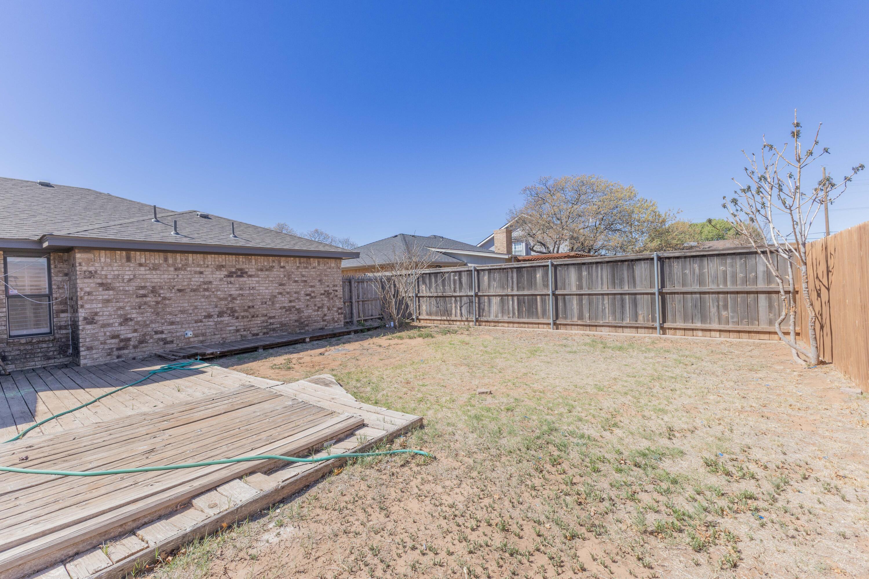 6036 71st Street Lubbock, TX 79424 - Photo 15 of 15 a view of a backyard