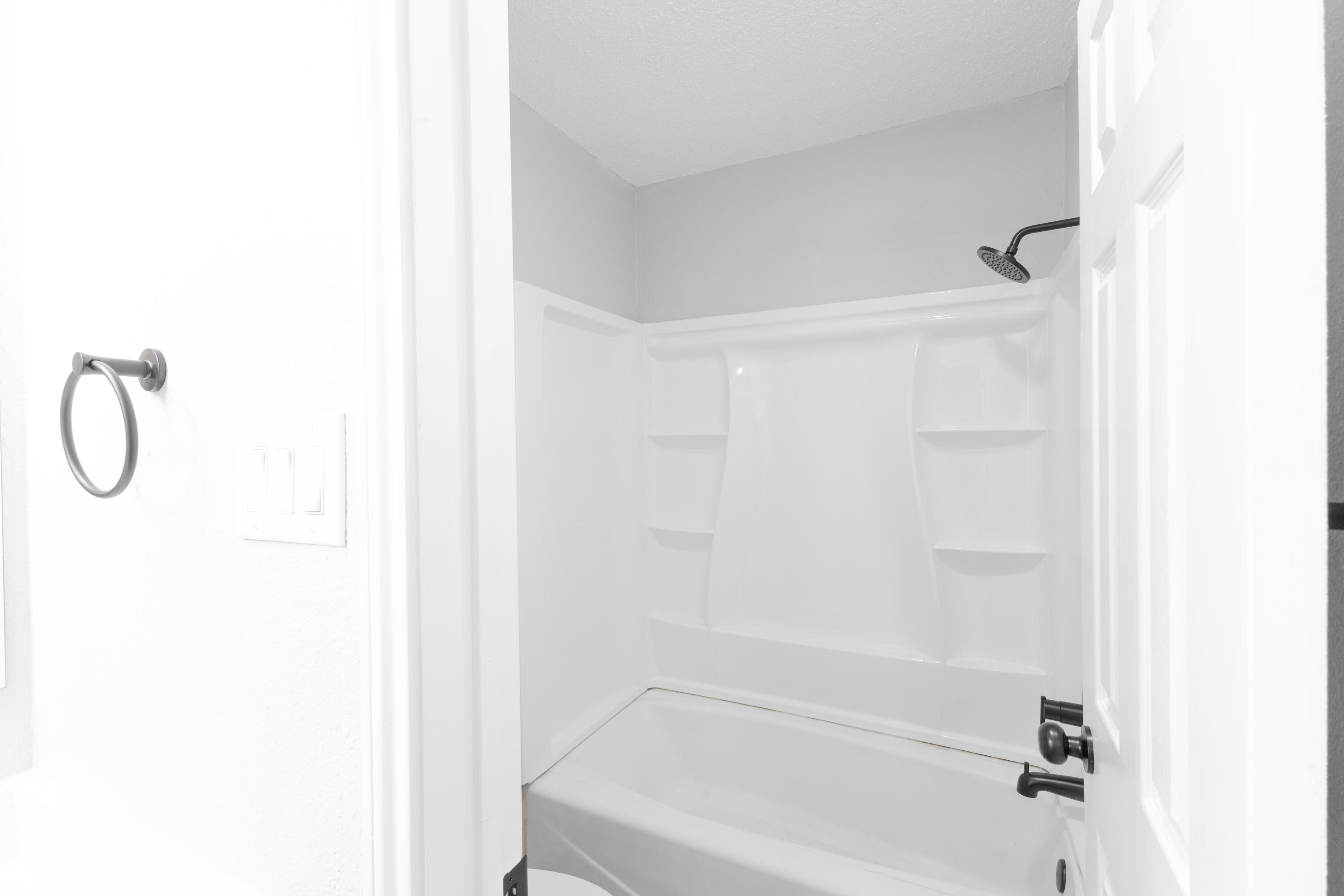 6036 71st Street Lubbock, TX 79424 - Photo 10 of 15 a bathroom with a shower