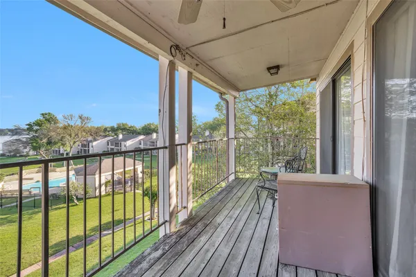 a view of a balcony with lake view and a ocean view