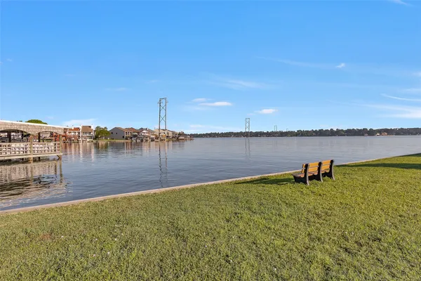 a view of a lake with a outdoor space