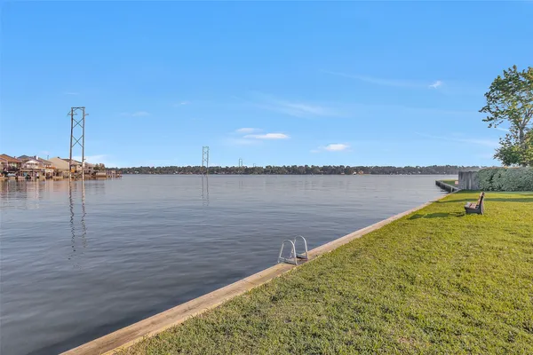 a view of a yard with furniture and a yard