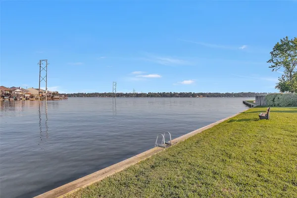 a view of a yard with furniture and a yard
