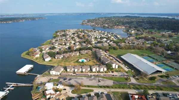 an aerial view of a house with swimming pool