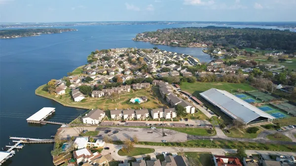 an aerial view of a house with swimming pool