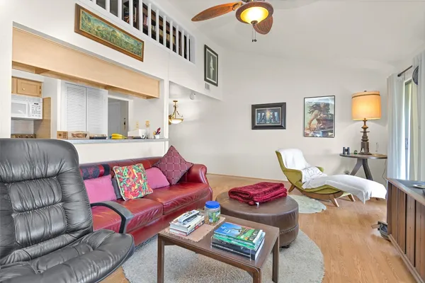 a living room with furniture and a window