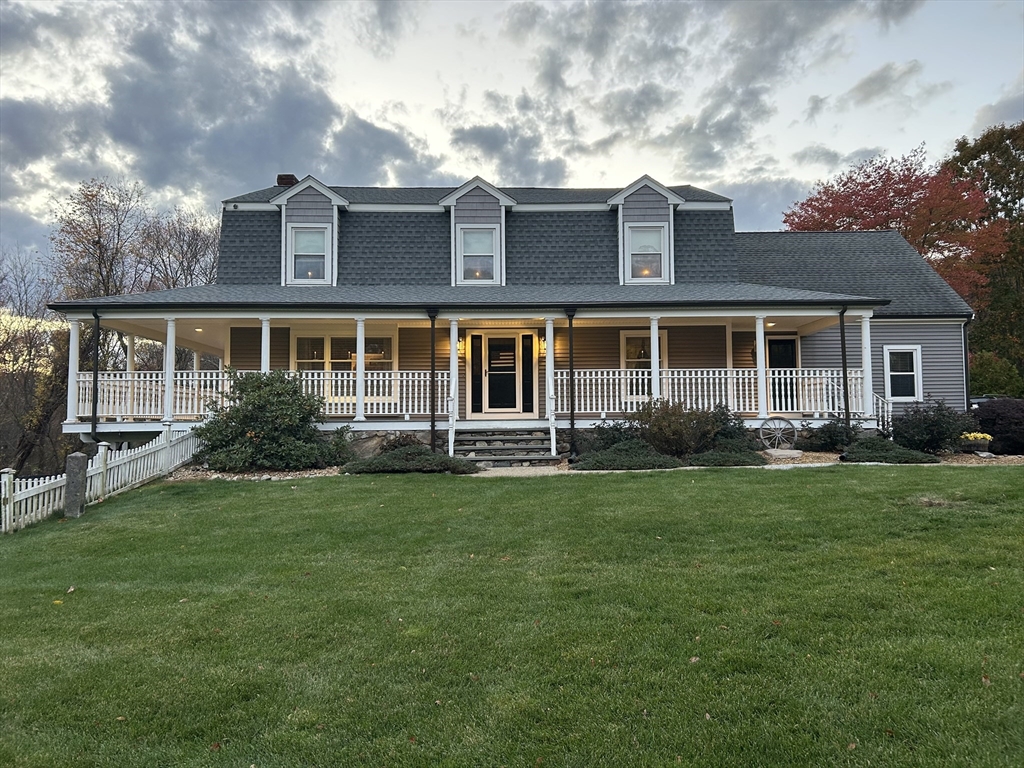 51 Albee Road Uxbridge, MA 01569 - Photo 2 of 42 a front view of a house with a garden
