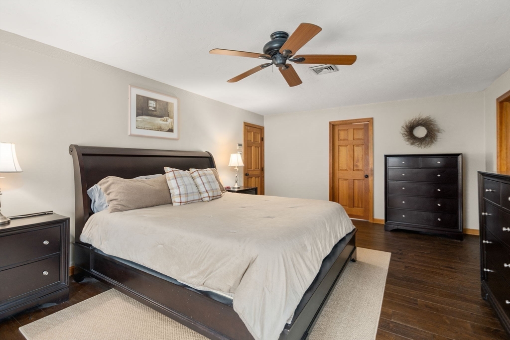 51 Albee Road Uxbridge, MA 01569 - Photo 30 of 42 a bedroom with a bed and a dresser