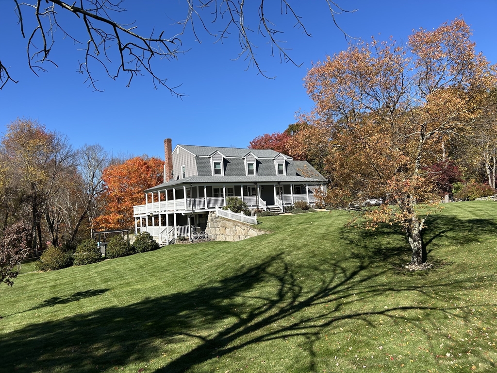 51 Albee Road Uxbridge, MA 01569 - Photo 3 of 42 a view of a house with a big yard