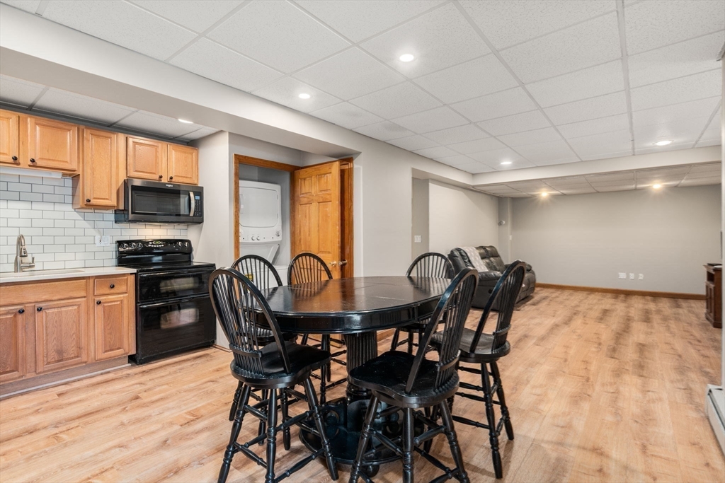 51 Albee Road Uxbridge, MA 01569 - Photo 40 of 42 a view of a dining room with furniture window and wooden floor