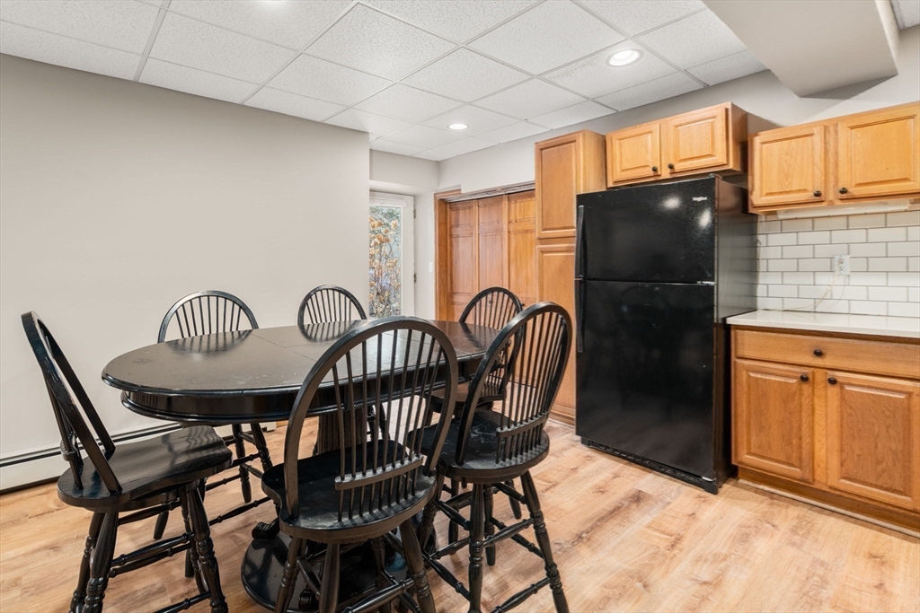 51 Albee Road Uxbridge, MA 01569 - Photo 41 of 42 a view of a dining room with furniture
