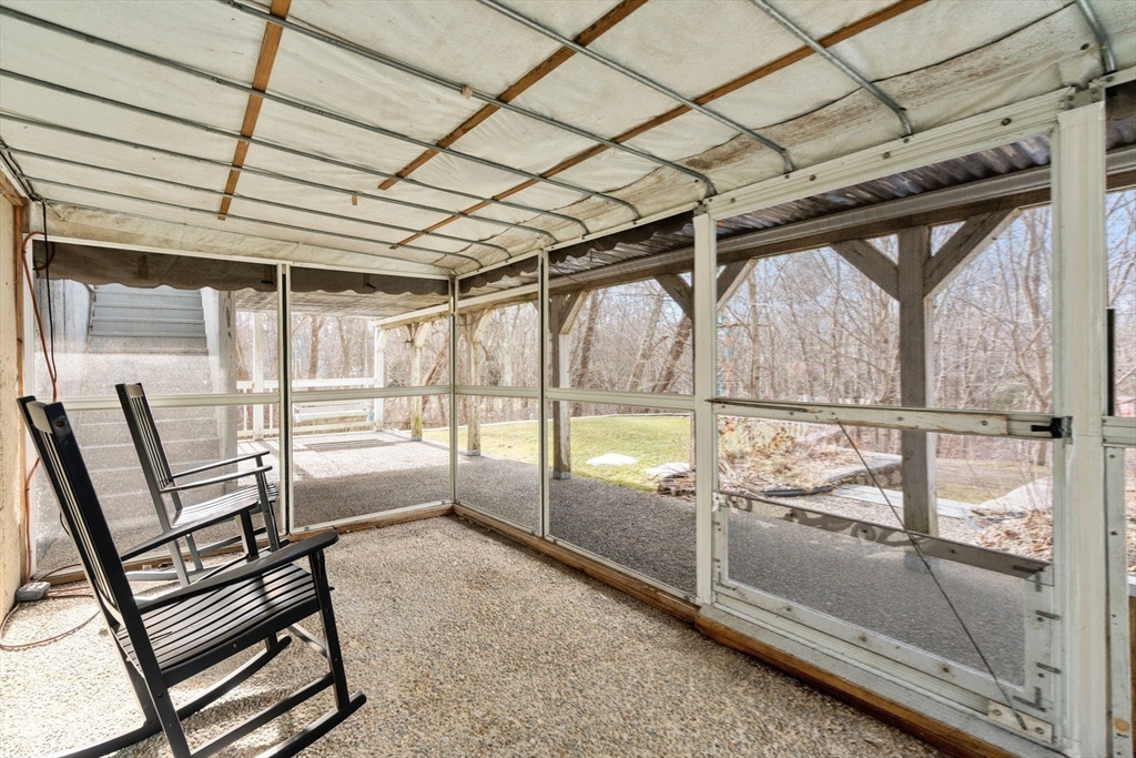 51 Albee Road Uxbridge, MA 01569 - Photo 42 of 42 a view of an empty room with wooden floor and furniture
