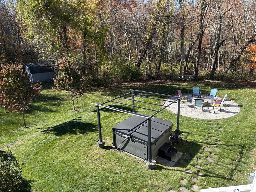 51 Albee Road Uxbridge, MA 01569 - Photo 6 of 42 a view of a chairs and table in the garden
