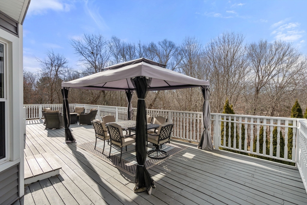 51 Albee Road Uxbridge, MA 01569 - Photo 10 of 42 a view of balcony with wooden floor and outdoor seating