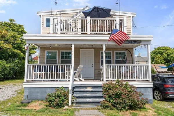 a front view of a house with a porch