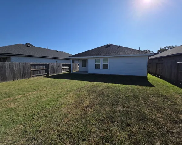 a house view with a garden space
