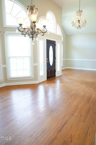 a white refrigerator freezer sitting inside of a kitchen
