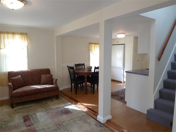 323 Appleton Street Arlington, MA 02476 - Photo 4 of 9 a living room with furniture and a dining table