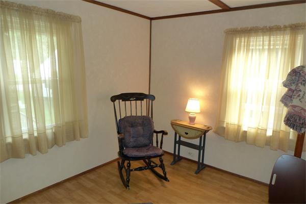 323 Appleton Street Arlington, MA 02476 - Photo 8 of 9 a view of a workspace with furniture and a window