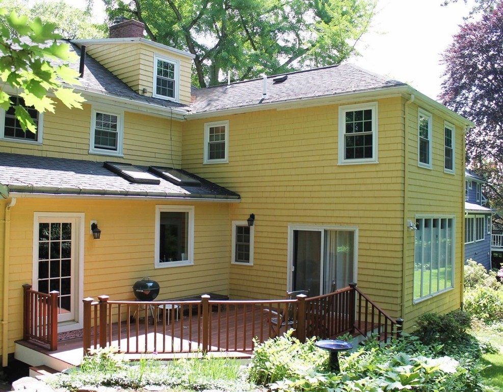 6 Hastings Road Lexington, MA 02421 - Photo 25 of 30 a view of a house with a yard and a garden