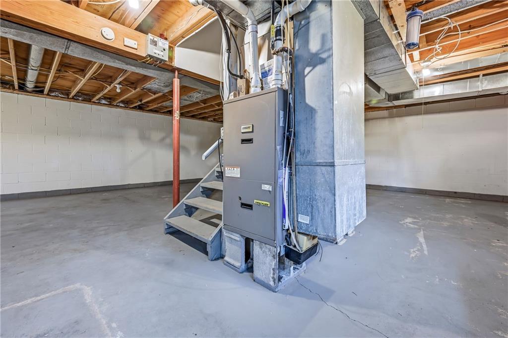 3451 East State Road Jamestown, PA 16134 - Photo 36 of 49 Rheem heater, ductwork, clean utility space