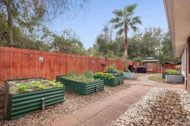 a garden view with a seating space