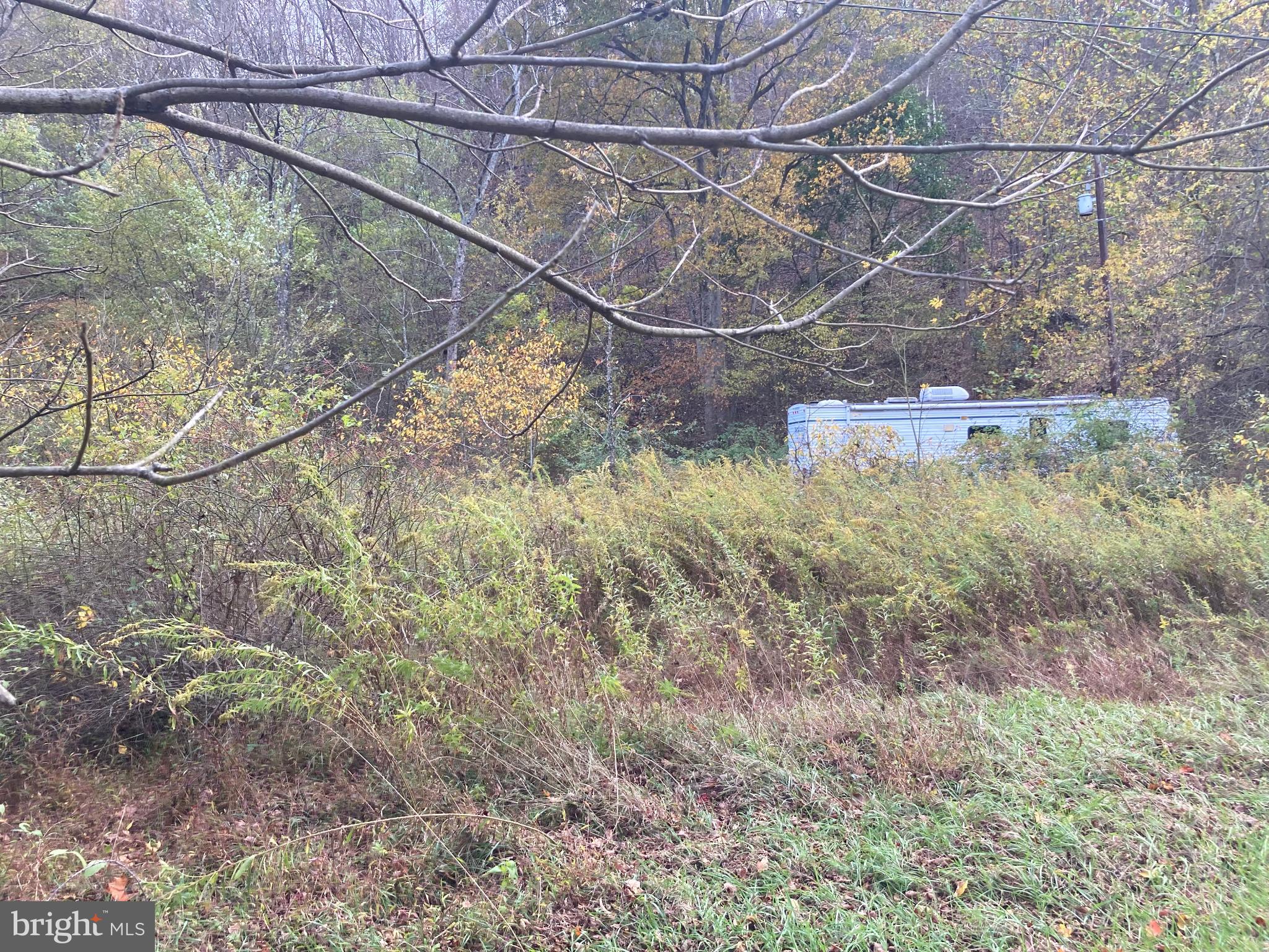 Secluded retreat amidst autumn foliage.