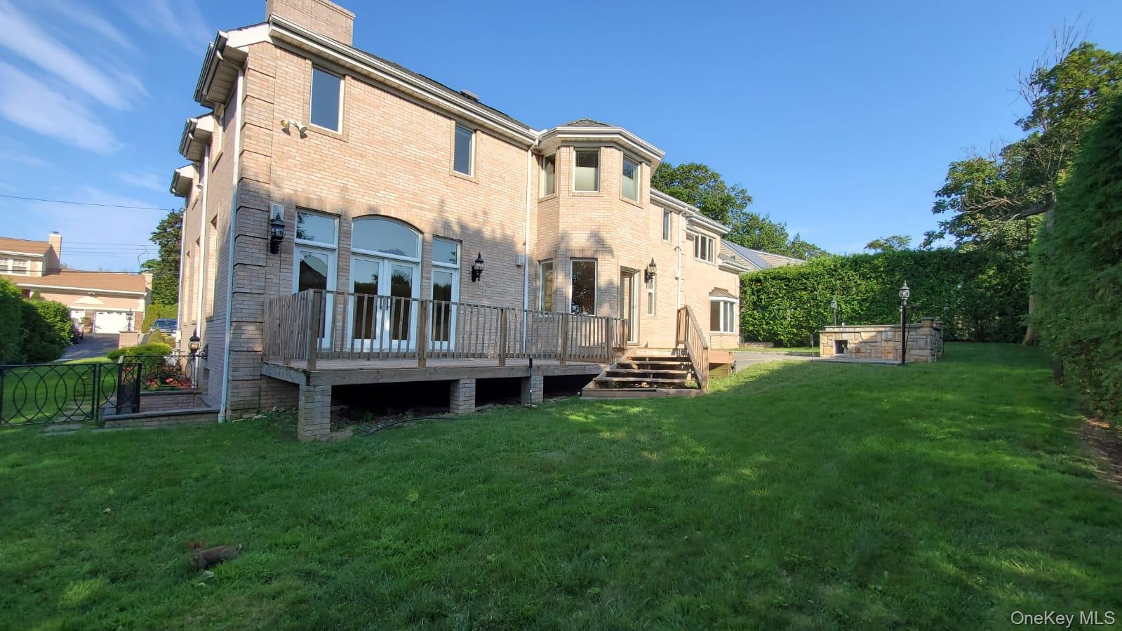 14 Potters Lane New Rochelle, NY 10805 - Photo 14 of 14 a view of a house with a yard