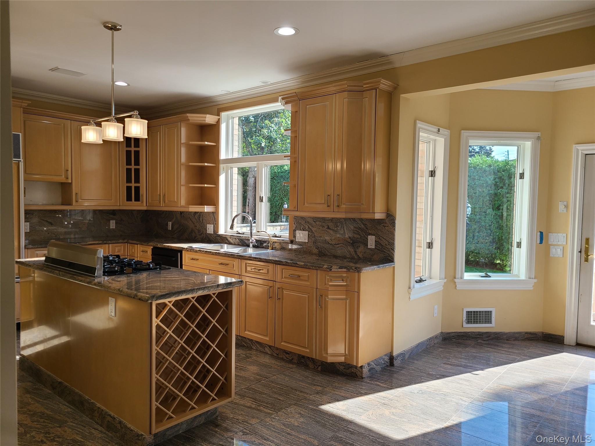 14 Potters Lane New Rochelle, NY 10805 - Photo 4 of 14 a kitchen with stainless steel appliances granite countertop a sink a stove a counter space and a window