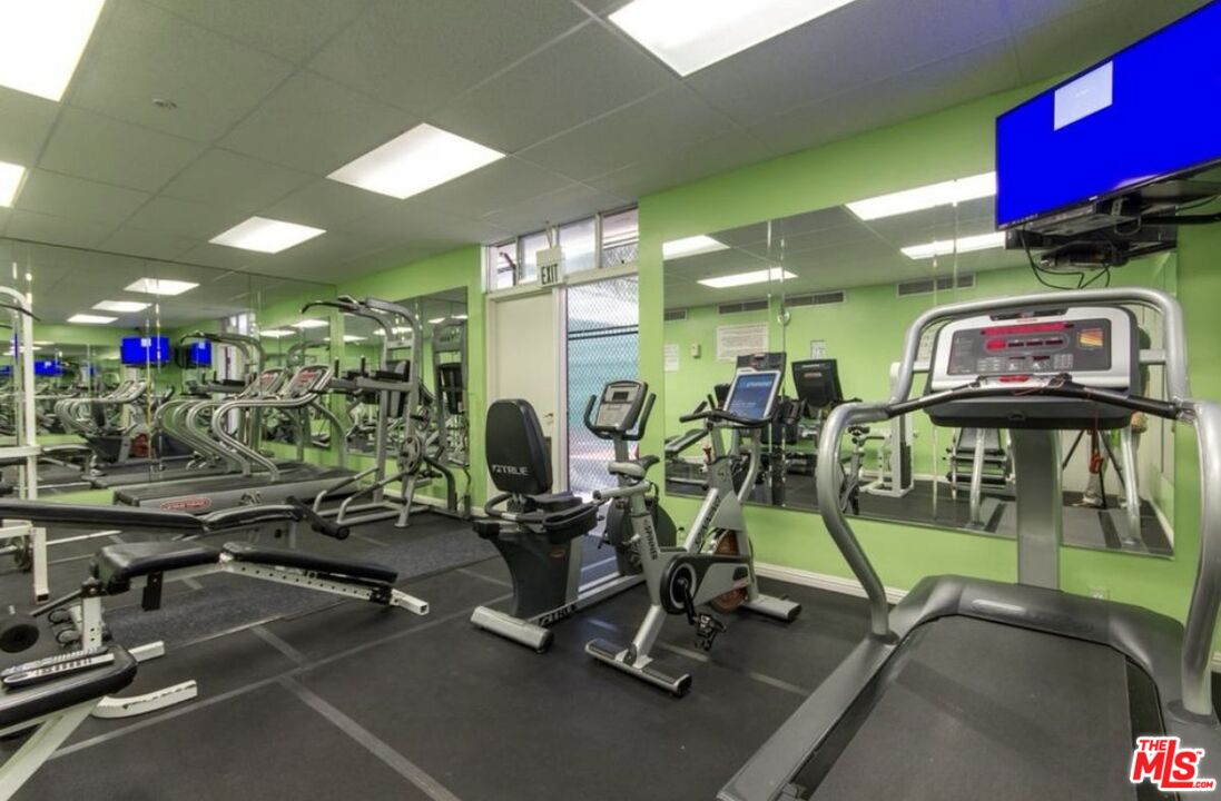 10535 Wilshire Boulevard, Unit 1701 Los Angeles, CA 90024 - Photo 18 of 18 a view of a room with gym equipment