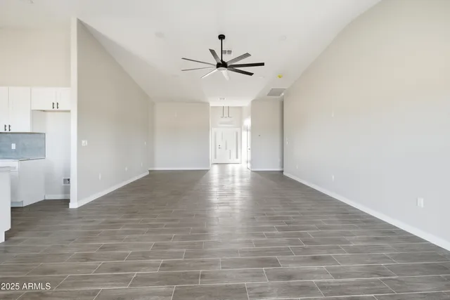a view of a kitchen with electric appliances