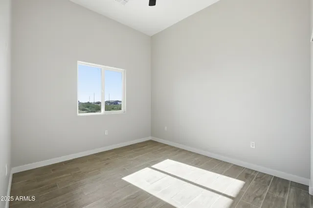 a view of a room with white walls