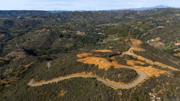 an aerial view of residential house and outdoor space