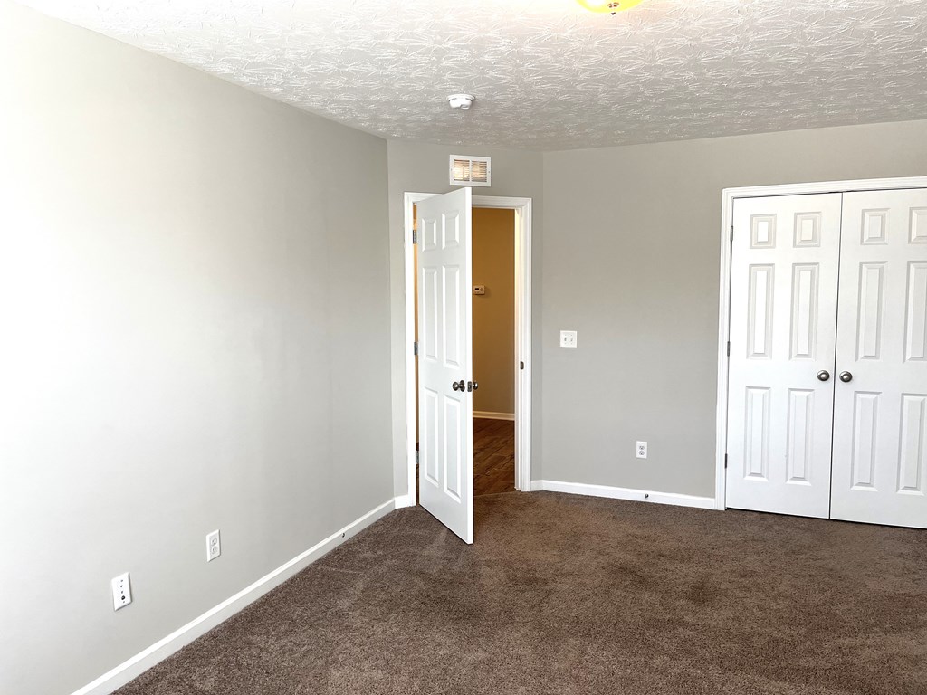 6067 Townes Way Columbus, GA 31909 - Photo 25 of 35 an empty room with windows and closet