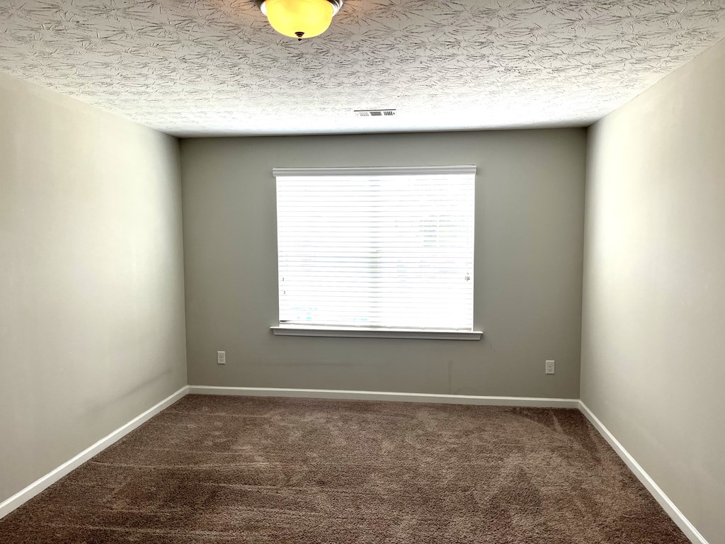 6067 Townes Way Columbus, GA 31909 - Photo 29 of 35 a view of a sink a window and cabinets