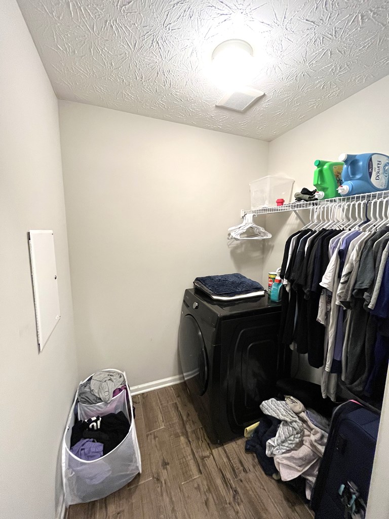 6067 Townes Way Columbus, GA 31909 - Photo 32 of 35 a bedroom with a bed and wooden floor