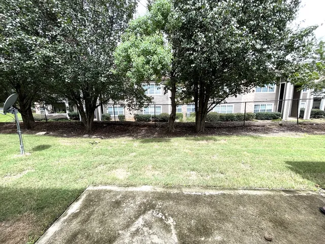 a view of a yard with a trees