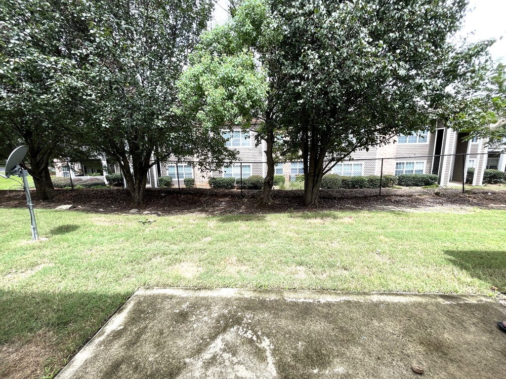 6067 Townes Way Columbus, GA 31909 - Photo 34 of 35 a view of a yard with a trees