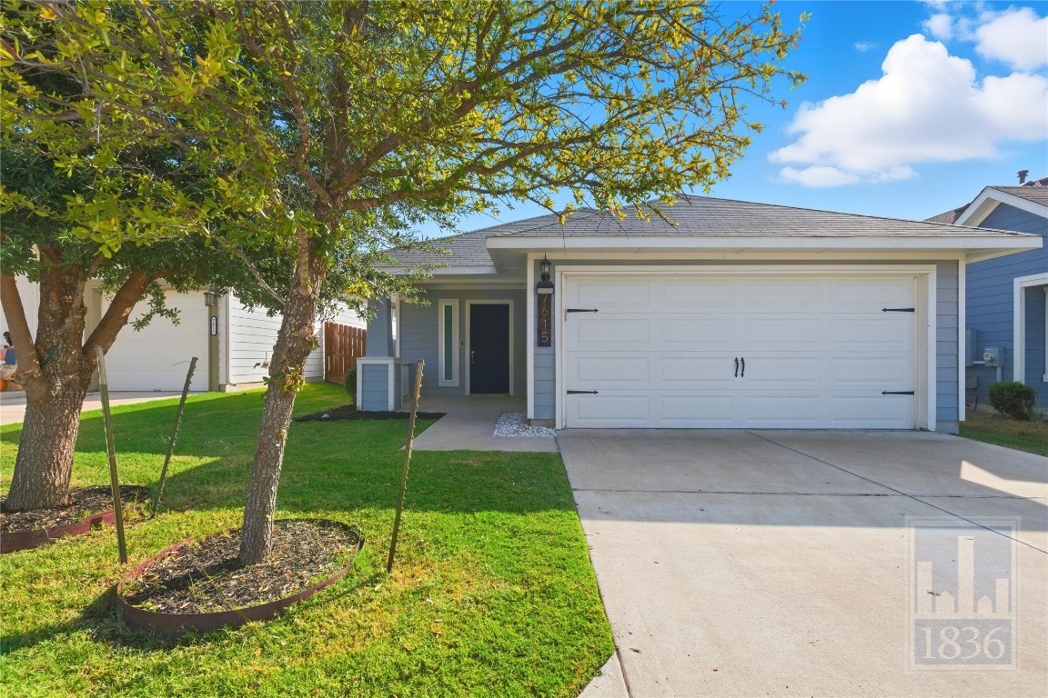 7615 Europa Avenue, Unit 139 Round Rock, TX 78665 - Photo 1 of 40 a house view with a garden space